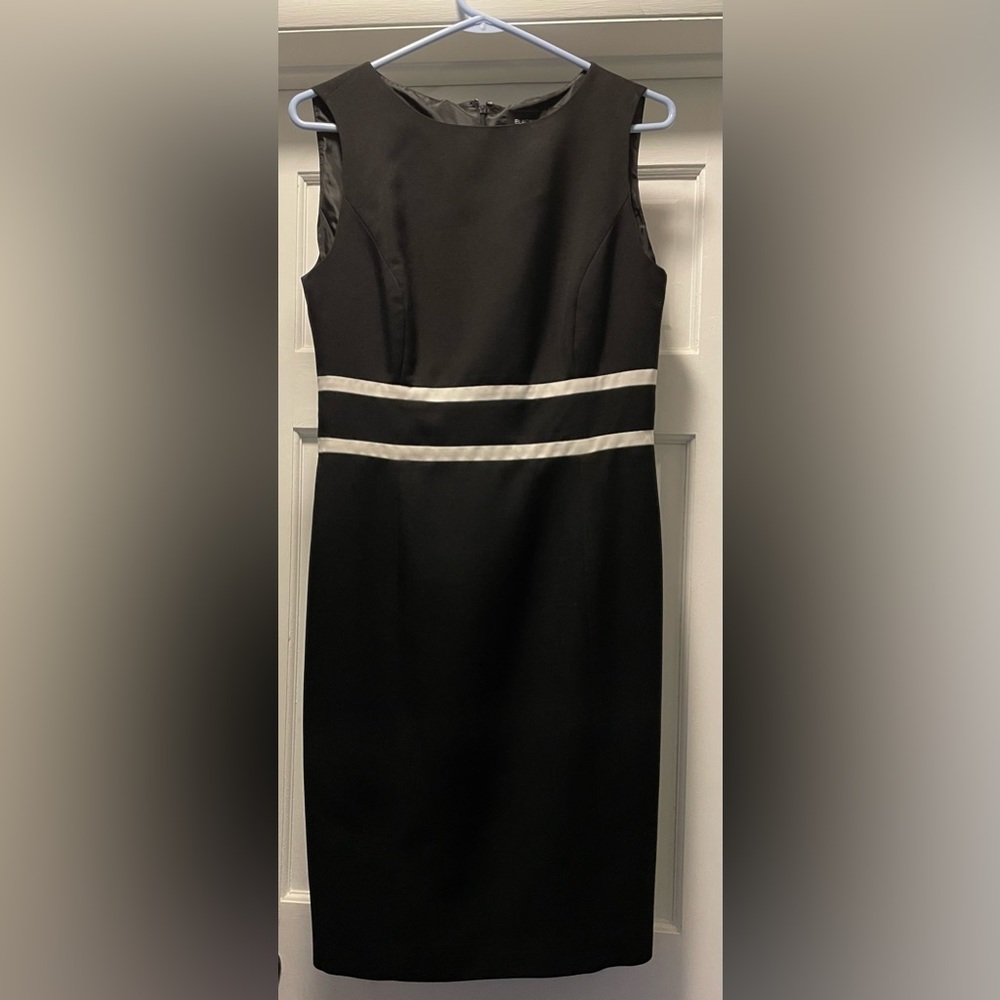Worn once! Black dress with white detail.